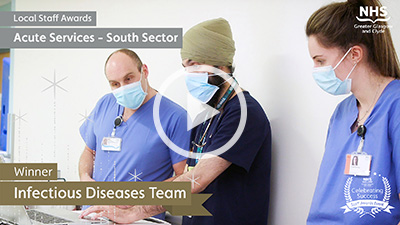 team of 2 men and 1 women in scrubs and surgical masks