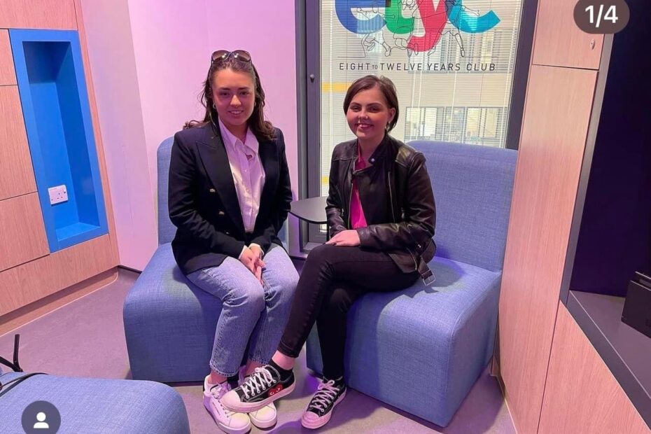 Sara Millar and Molly Cuddihy sitting in the Schiehallion Ward at the Royal Hospital for Children