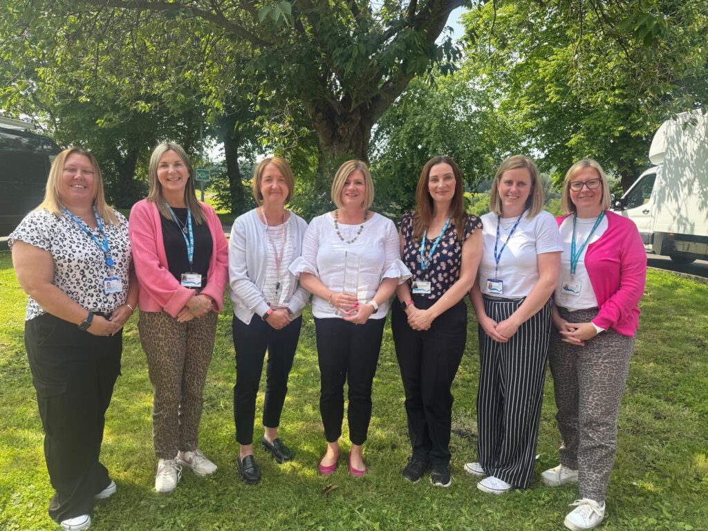 Allied Health Professions (AHP) Practice Education Team with Better Workplace Award Winners Trophy 2025