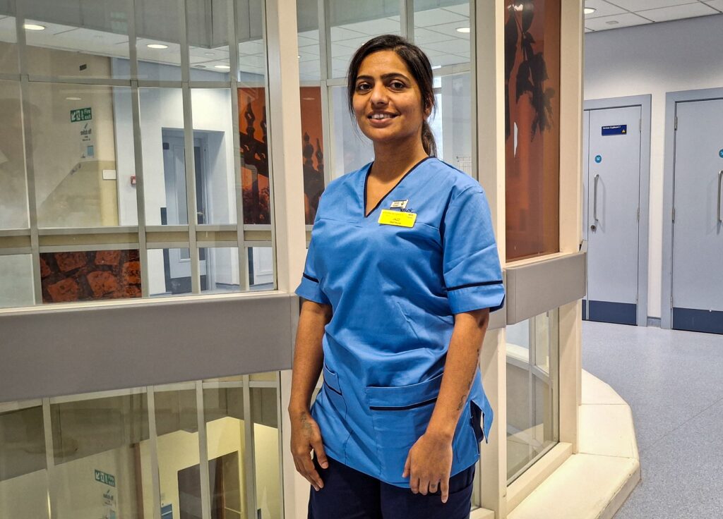 Newly qualified nurse Jaspreet Deerhe outside her ward at Glasgow Royal Infirmary