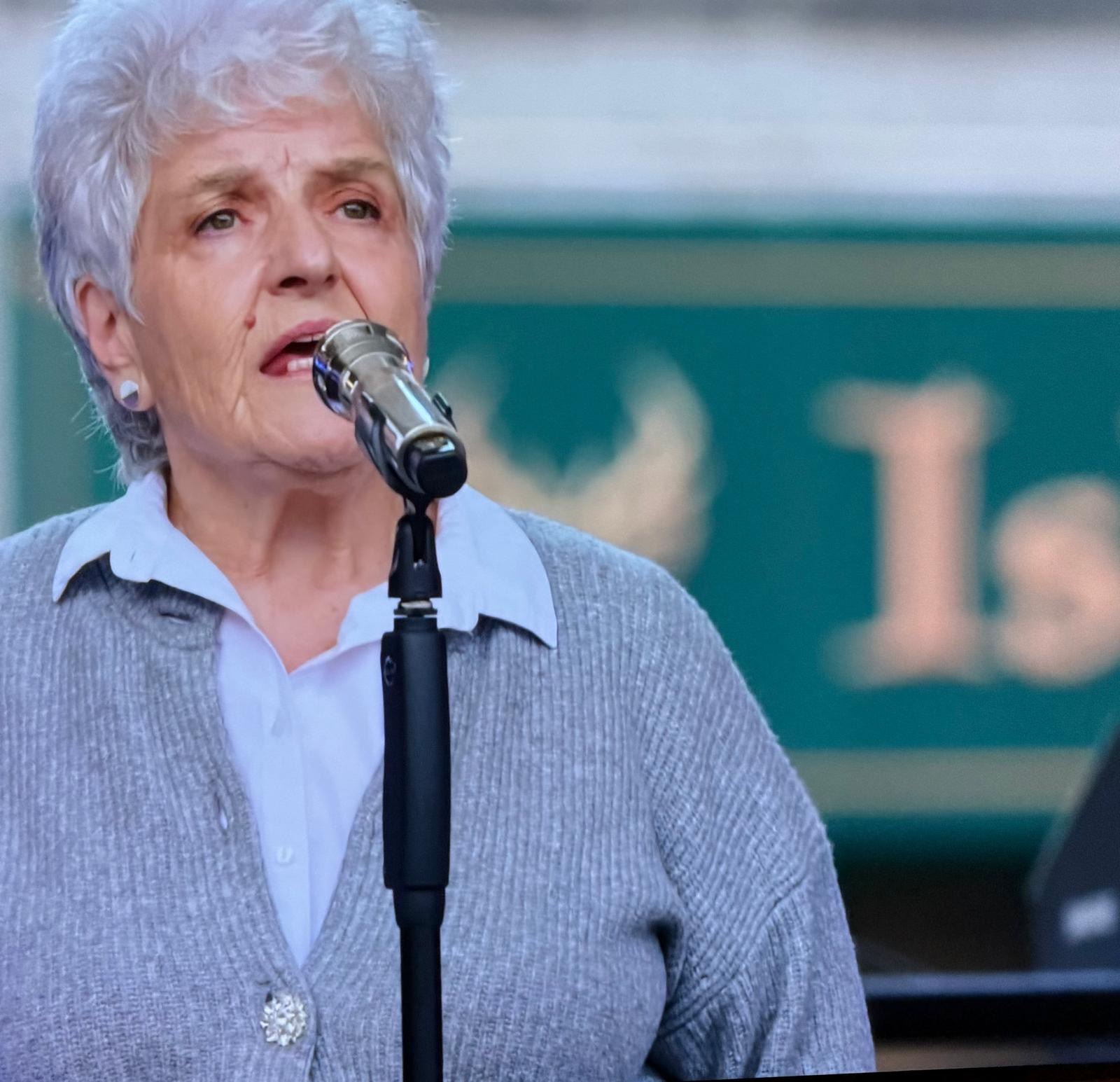 NHSGGC volunteer moves national TV audience with song sung for D‑Day veteran