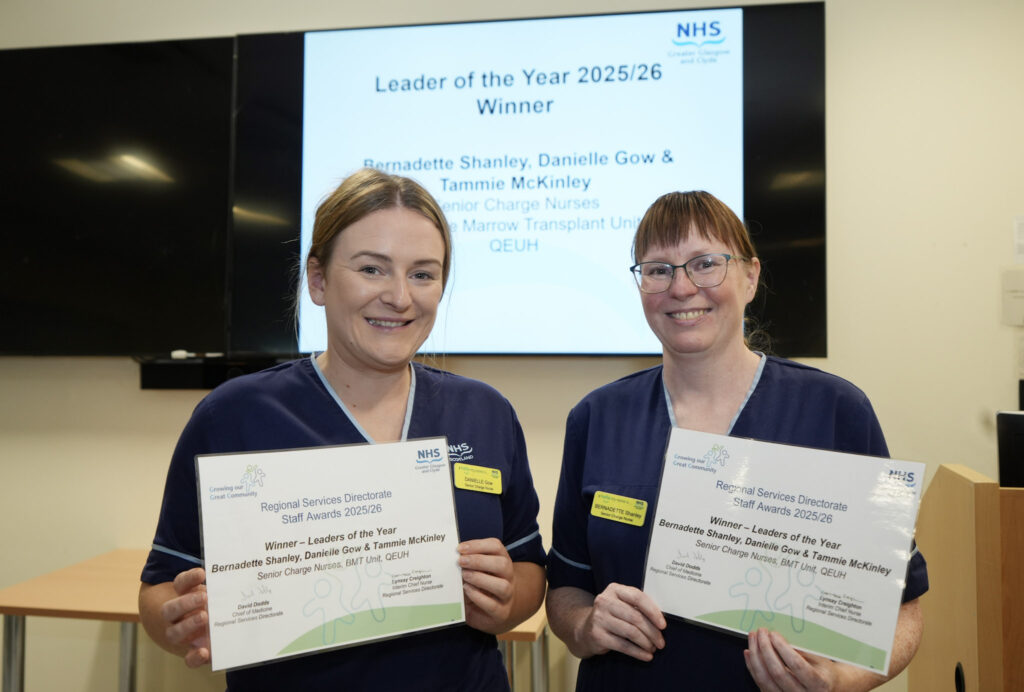 Two of the three leader of the year winners