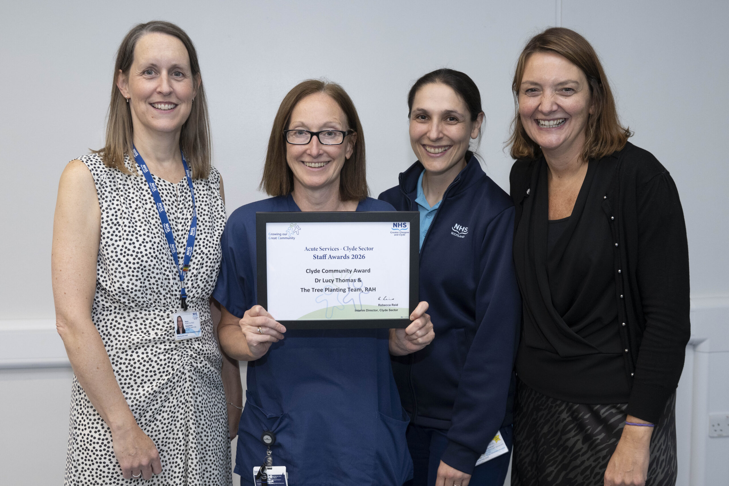 Winner of the Clyde Community Award - Dr Lucy Thomson and the RAH tree planting team.